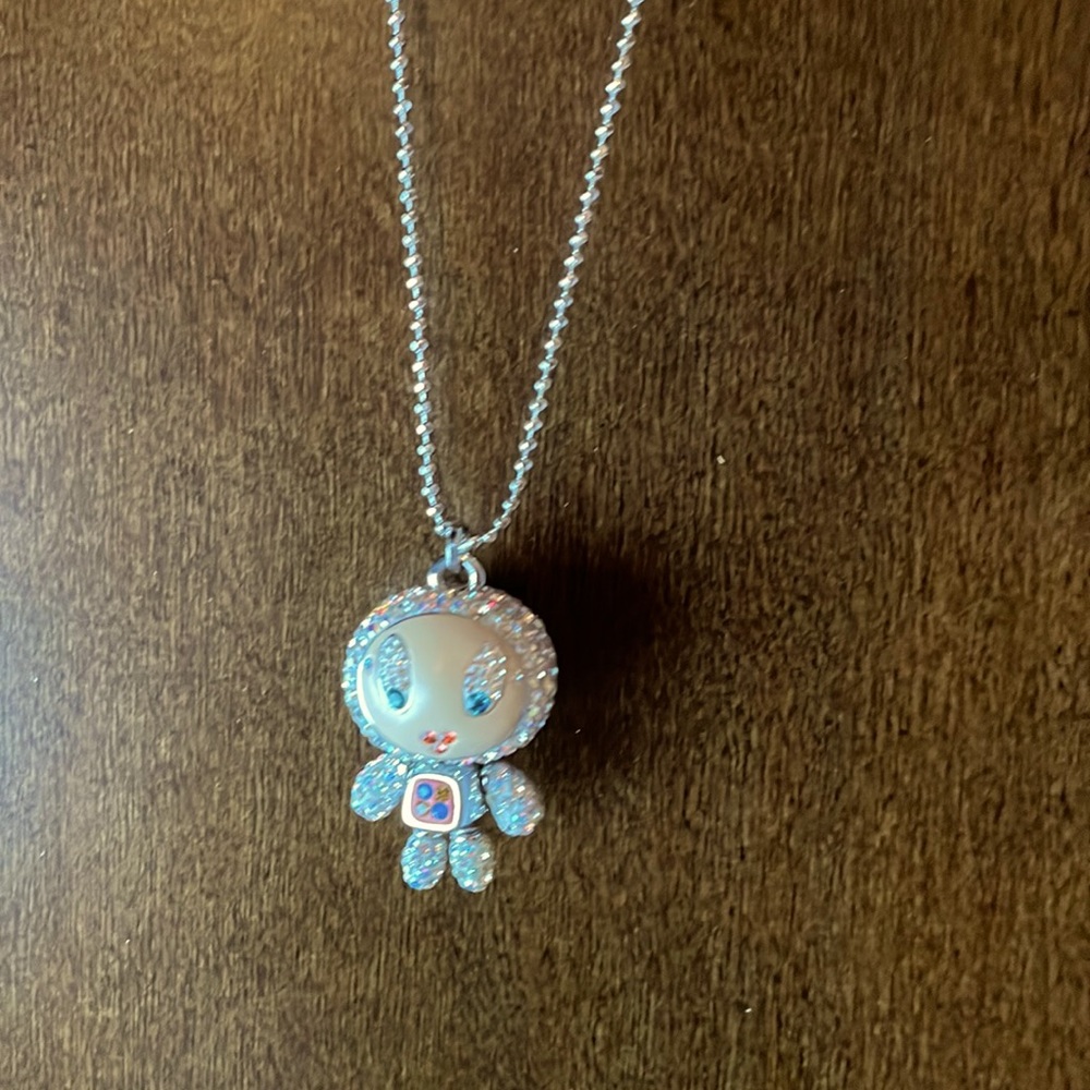 Swarovski crystal character pendant with chain.